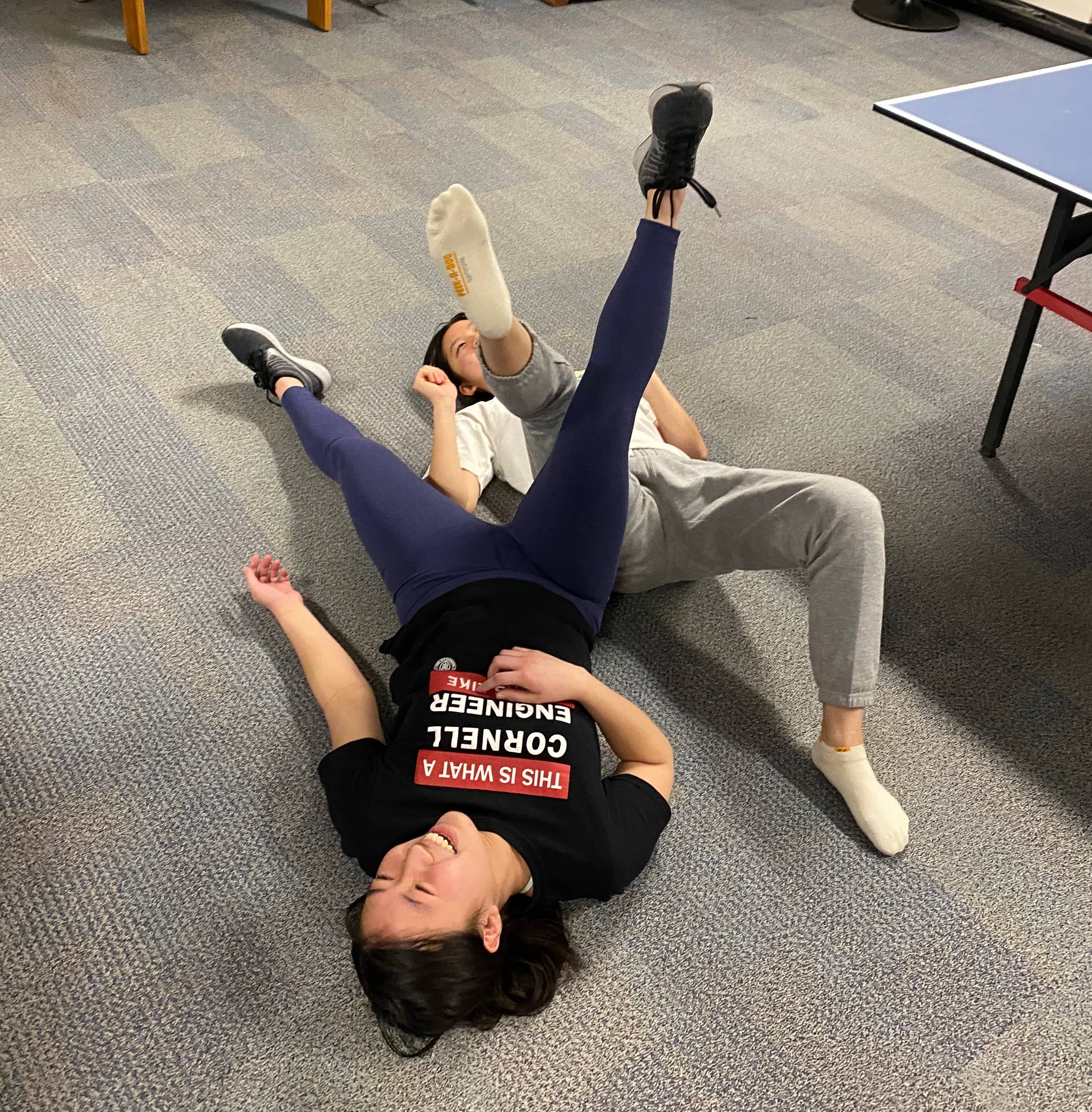 Grace and Elisabeth wrestle with their legs